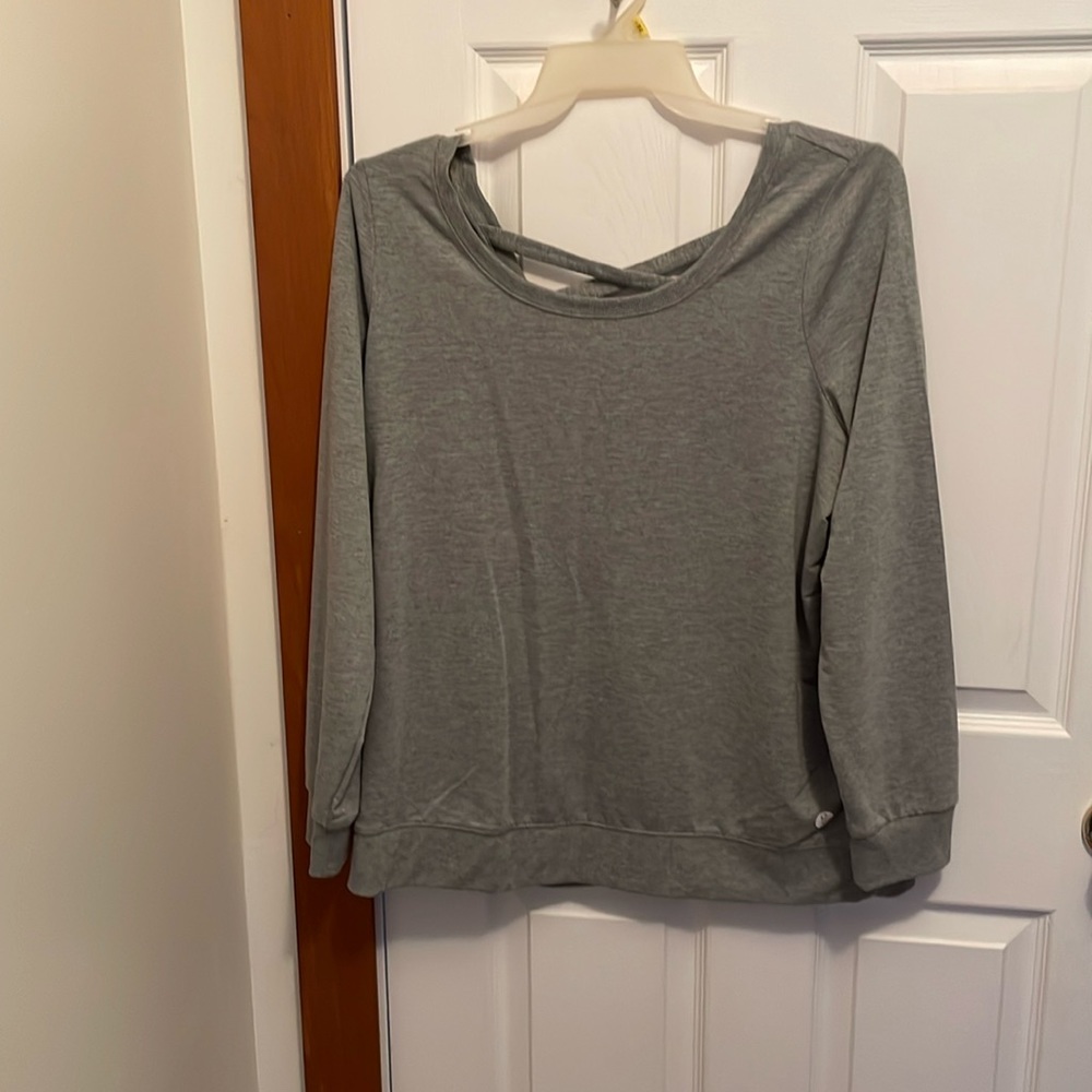 NEW w/ tags Doesn’t fit Heather Grey off the shoulders sweater. Criss Cross back